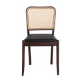 PEVRON schwarzer Kunstlederstuhl mit Rattan